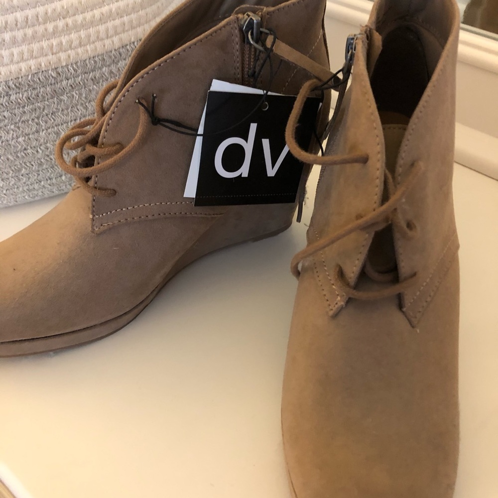 Wedge ankle  boots with zipper.  New with tags.
